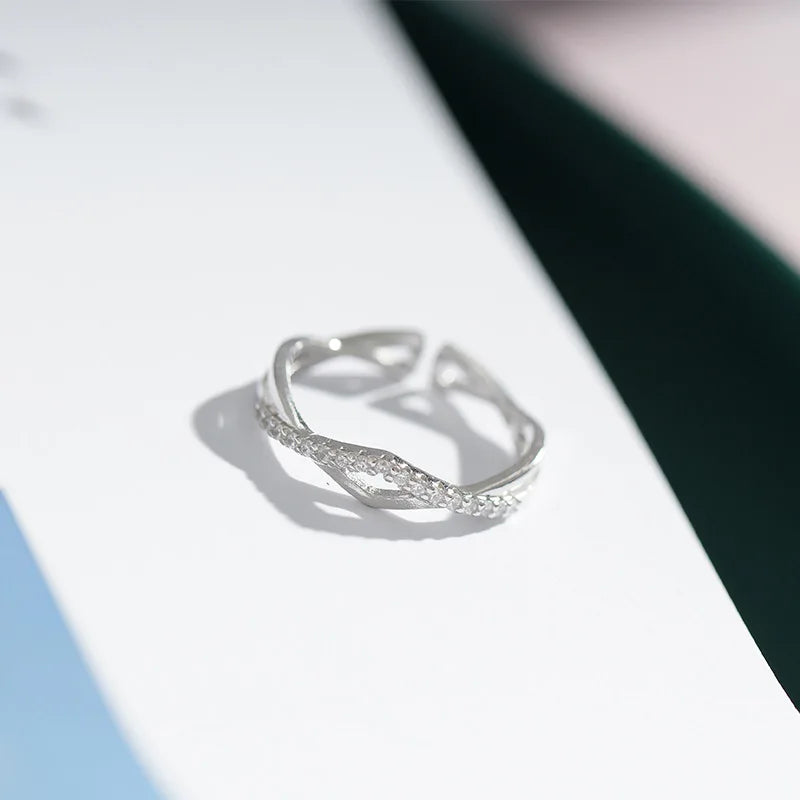 Double Cross Flashing Zircon Ring