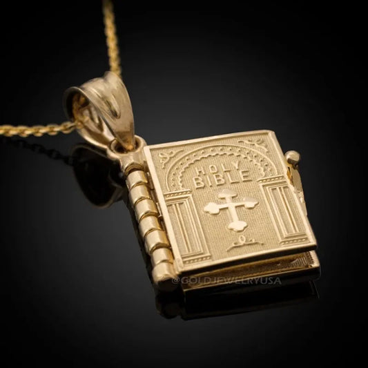 Religious necklace with a Holy Bible that can open up.